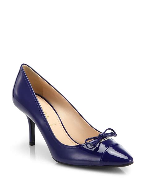 navy blue patent leather pumps.